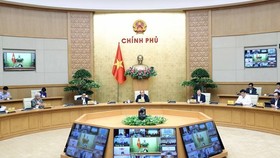 Prime Minister Nguyen Xuan Phuc (middle) at the event (Photo: VNA)