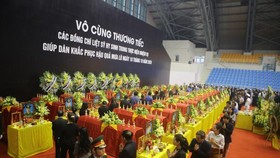 A memorial service for 22 soldiers who were buried in a landslide in Quang Tri Province is held on October 22. (Photo: SGG)