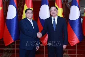 Thủ tướng Phạm Minh Chính hội kiến Thủ tướng Lào Sonexay Siphandone vào tháng 4 vừa qua. Ảnh: TTXVN