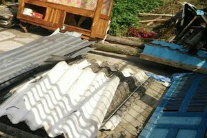 Hiện trường vụ lốc xoáy ở thị trấn Phước Long. Ảnh: CTV