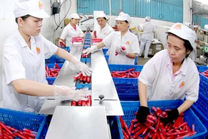 Sản xuất xúc xích tại Công ty Vissan đã cổ phần hóa