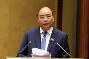 Thủ tướng Chính phủ Nguyễn Xuân Phúc trả lời chất vấn. Ảnh: VGP
