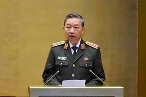 Bộ trưởng Tô Lâm giải trình trước Quốc hội, ảnh Viết Chung