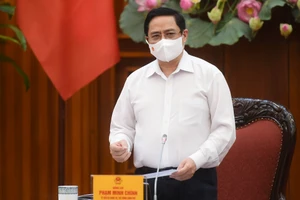 Thủ tướng Chính phủ Phạm Minh Chính tại cuộc họp Thường trực Chính phủ về phòng, chống dịch Covid-19. ẢNH: VIẾT CHUNG