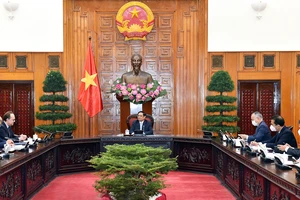 Thủ tướng Phạm Minh Chính tiếp Đại sứ Liên bang Nga tại Việt Nam Bezdetko tới chào xã giao. Ảnh: VIẾT CHUNG