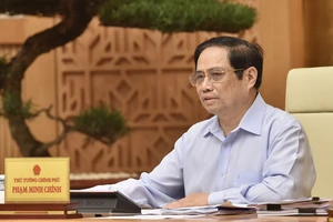 Thủ tướng Phạm Minh Chính chủ trì hội nghị trực tuyến toàn quốc. Ảnh: VIẾT CHUNG