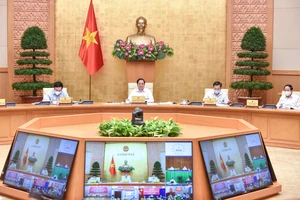 Thủ tướng Phạm Minh Chính chủ trì họp Ban Chỉ đạo quốc gia về phòng chống dịch. Ảnh: VIẾT CHUNG