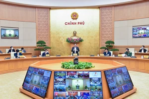 Thủ tướng Phạm Minh Chính chủ trì họp Chính phủ về phòng chống dịch. ẢNH: VIẾT CHUNG