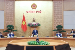 Thủ tướng Phạm Minh Chính chủ trì họp Chính phủ tháng 2-2022. Ảnh: VIẾT CHUNG