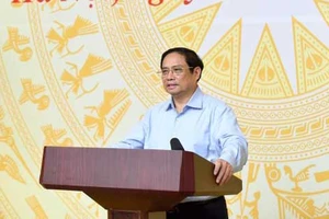 Thủ tướng Chính phủ Phạm Minh Chính chủ trì và phát biểu tại phiên họp thứ ba của Ủy ban Quốc gia về chuyển đổi số, sáng 8-8. Ảnh: VIẾT CHUNG
