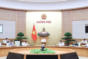 Thủ tướng Phạm Minh Chính chủ trì và phát biểu tại phiên họp Chính phủ thường kỳ xây dựng pháp luật, sáng 26-7. Ảnh: VIẾT CHUNG