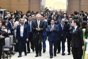 Thủ tướng Phạm Minh Chính và Thủ tướng Lý Hiển Long dự hội nghị. Ảnh: QUANG PHÚC