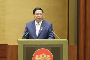 Thủ tướng Chính phủ Phạm Minh Chính trình bày báo cáo. Ảnh: QUANG PHÚC