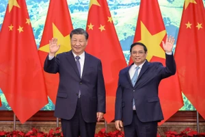 Thủ tướng Phạm Minh Chính và Tổng Bí thư, Chủ tịch nước Trung Quốc Tập Cận Bình chụp ảnh chung. Ảnh: VIẾT CHUNG