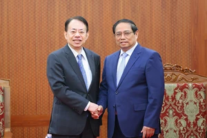 Thủ tướng Phạm Minh Chính tiếp Chủ tịch Ngân hàng Phát triển châu Á (ADB) Masatsugu Asakawa, chiều 13-3. Ảnh: VIẾT CHUNG