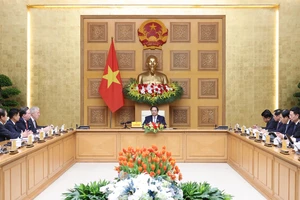 Thủ tướng Phạm Minh Chính tiếp đoàn doanh nghiệp Hội đồng Kinh doanh Hoa Kỳ - ASEAN. Ảnh: VIẾT CHUNG