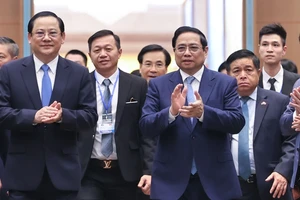 Thủ tướng Phạm Minh Chính và Thủ tướng Lào Sonexay Siphandone đồng chủ trì kỳ họp Ủy ban liên Chính phủ về hợp tác song phương Việt Nam - Lào. Ảnh: VIẾT CHUNG