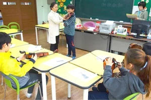 Giờ học nhạc tại một trường tiểu học đa văn hóa ở Hàn Quốc