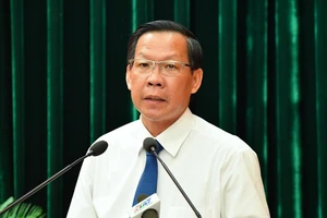 Đồng chí Phan Văn Mãi phát biểu tại một cuộc họp Ảnh: VIỆT DŨNG