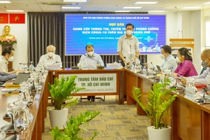Đồng chí Phạm Đức Hải, Phó Ban Chỉ đạo phòng chống dịch Covid-19 TPHCM thông tin tại buổi họp báo