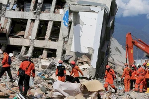 Động đất, sóng thần ngày 28-9-2018 ở Indonesia làm hơn 1.200 người thiệt mạng. Ảnh: REUTERS