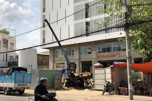 Trung tâm tim mạch - Bệnh viện Đà Nẵng chậm tiến độ vì Vinafor chưa bàn giao mặt bằng số nhà 138 Hải Phòng. Ảnh: NGUYÊN KHÔI
