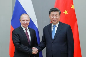 Tổng thống Vladimir Putin và Chủ tịch Tập Cận Bình. Ảnh: TÂN HOA XÃ 