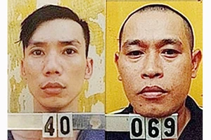 Hai đối tượng bị truy nã Nguyễn Viết Huy (40) và Nguyễn Văn Nưng (069). Ảnh: CQĐT
