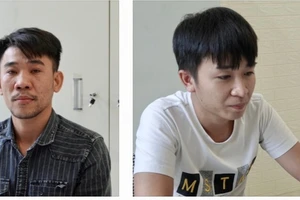 Lê Quang Hùng (trái) và Đỗ Đình Thi tại cơ quan điều tra. Ảnh: CQĐT