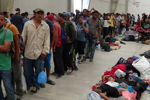 Người di cư tập trung ở Ixtepec, bang Oaxaca, Nam Mexico, trong đoàn caravan hướng đến biên giới Mỹ, ngày 28-4-2018. REUTERS