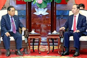 Chủ tịch nước Trần Đại Quang tiếp Phó Chủ tịch Quốc hội Lào Sengnouane Sayalat đang có chuyến thăm chính thức Việt Nam. Ảnh: Nhan Sáng/TTXVN