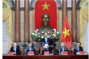 Chủ tịch nước Trần Đại Quang gặp mặt Đoàn đại biểu người Việt tài tăng trong lĩnh vực khoa học và công nghệ. Ảnh: TTXVN