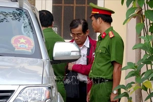 Ông Đỗ Ngọc Điệp tại cơ quan cảnh sát điều tra Công an tỉnh Bình Thuận vào chiều ngày 16-12