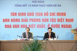 Phó Thủ tướng, Bộ trưởng Bộ Ngoại giao Phạm Bình Minh và Thứ trưởng Bộ Ngoại giao Lê Hoài Trung chủ trì hội nghị. Ảnh: TTXVN