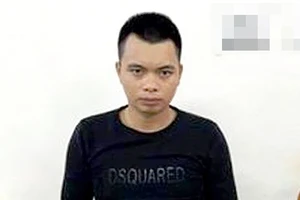 Nghi phạm Hà Phúc Đạt bị bắt giữ sau khi dùng súng bắn một tài xế taxi để cướp xe