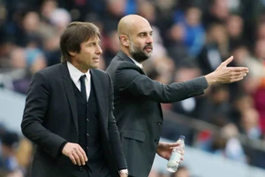 Antonio Conte (trái) không “ghen tị” với đồng nghiệp Pep Guardiola. Ảnh: Getty Images 