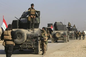 Binh sĩ Iraq tiến vào Mosul. Ảnh: REUTERS