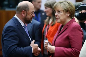 Hai ứng viên Martin Schulz và Angela Merkel trong cuộc đua vào chức Thủ tướng Đức. Ảnh: Business Insider