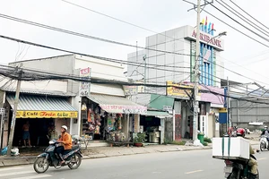 Nhà đất trên tuyến dọc quốc lộ 50 - đoạn khu Nam xã Bình Hưng, huyện Bình Chánh - sẽ được xem xét cấp giấy chủ quyền cho người dân