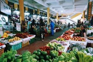 Quận huyện được ban hành giá sử dụng diện tích tại chợ