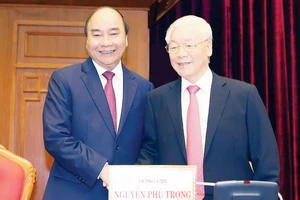 Tổng Bí thư, Chủ tịch nước Nguyễn Phú Trọng và Thủ tướng Nguyễn Xuân Phúc tại hội nghị. Ảnh: TTXVN