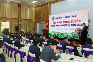 Bảo hiểm Xã hội Việt Nam tổ chức Hội nghị Tổng kết công tác năm 2021 và triển khai nhiệm vụ năm 2022 của ngành. Ảnh: TTXVN