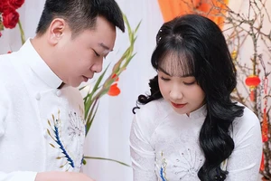 Bạn trẻ Nguyễn Thị Thanh Mai và chồng trong đám cưới. Ảnh: NVCC