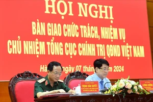 Đại tướng Lương Cường và Thượng tướng Trịnh Văn Quyết tại hội nghị bàn giao. Nguồn: QĐND