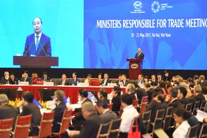 Thủ tướng Nguyễn Xuân Phúc phát biểu khai mạc Hội nghị Bộ trưởng Thương mại APEC lần thứ 23. Ảnh: VGP