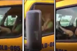 VIDEO: Tài xế xe container tay cầm điện thoại, lái xe bằng chân qua cầu Phú Mỹ