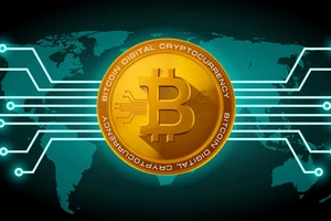 Đồng tiền ảo Bitcoin đã lần đầu tiên vượt mốc 10.000 USD/Bitcoin ở đầu phiên giao dịch ngày 29-11 tại các thị trường châu Á