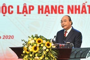 BAN BIÊN TẬP Thủ tướng Nguyễn Xuân Phúc phát biểu tại Hội nghị. Ảnh: VGP