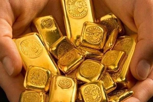 Giá vàng thế giới đạt mốc cao nhất trong hơn một tháng qua
