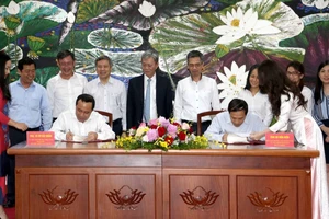 Bộ Tài chính, ĐH Quốc gia TPHCM ký hiệp định vay phụ